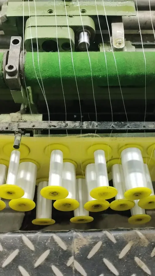 Shuttle embroidery machine producing guipure lace at Decent Lace Trader, Faisalabad