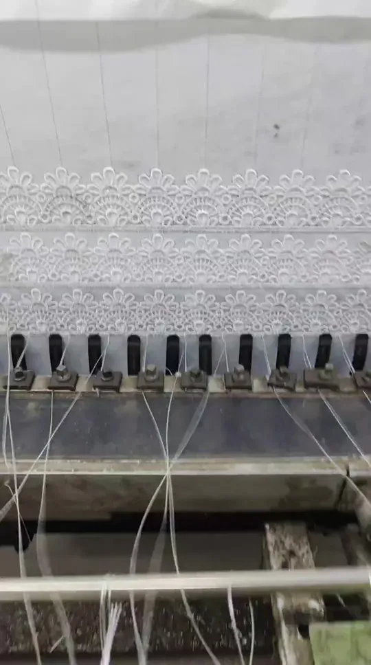 Guipure lace production on shuttle machines in Faisalabad