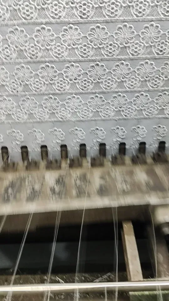 Guipure lace production on shuttle machines in Faisalabad