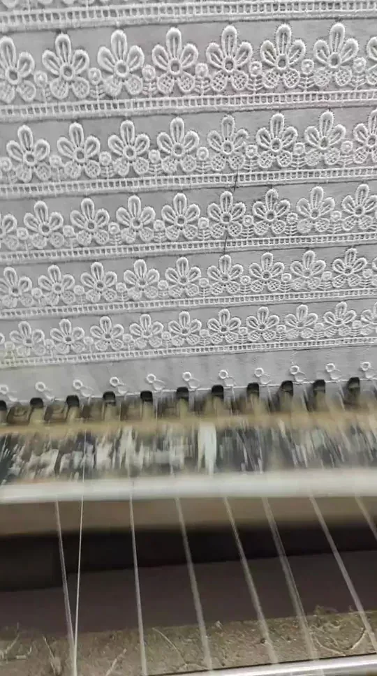 Guipure lace production on shuttle machines in Faisalabad
