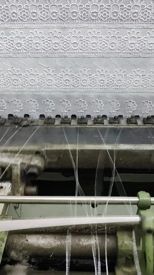 Guipure lace production on shuttle machines in Faisalabad
