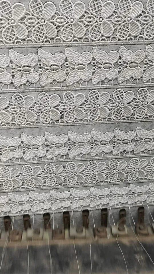 Guipure lace production on shuttle machines in Faisalabad